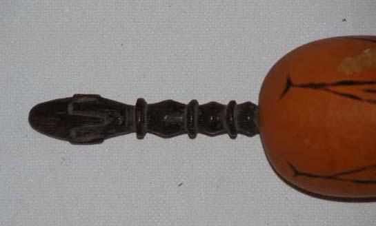 EA/67/21 - 
lime container and licking stick 
