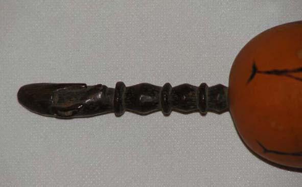 EA/67/21 - 
lime container and licking stick 
