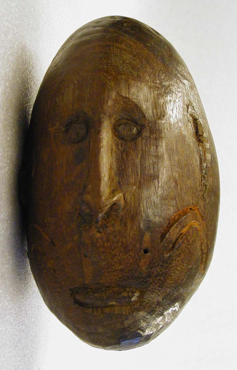 EA/14/13 - 
carving of a human head 

