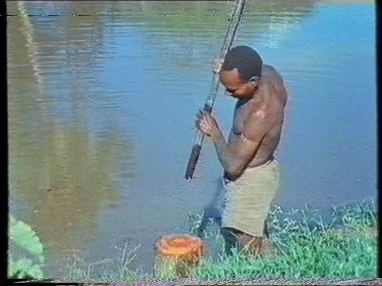 FI/1200/55 - 
Matjemosh: A woodcarver from the village of Amanamka, Asmat tribe, on the Southern West coast of New Guinea
