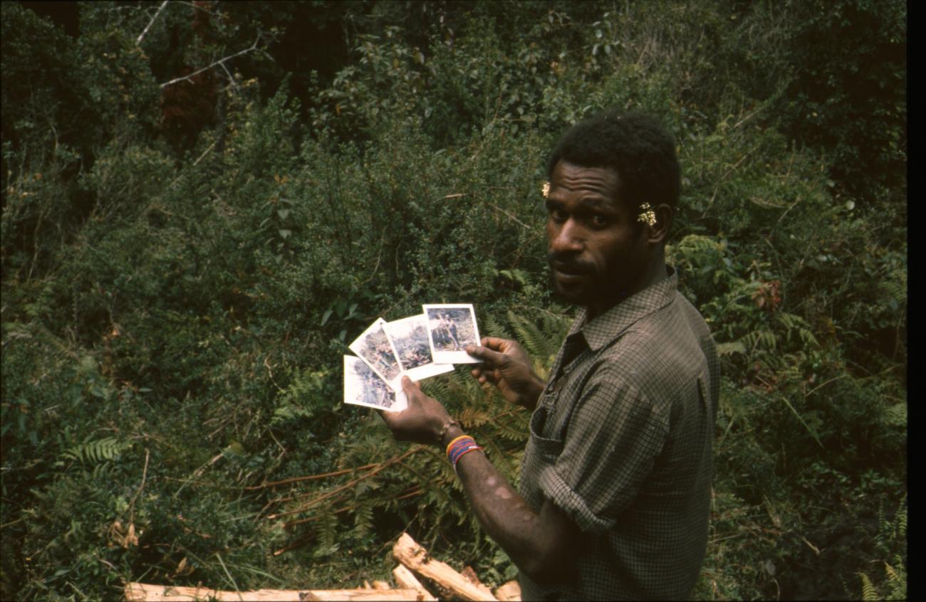 BD/166/12 - 
Portrait of man with Polaroids
