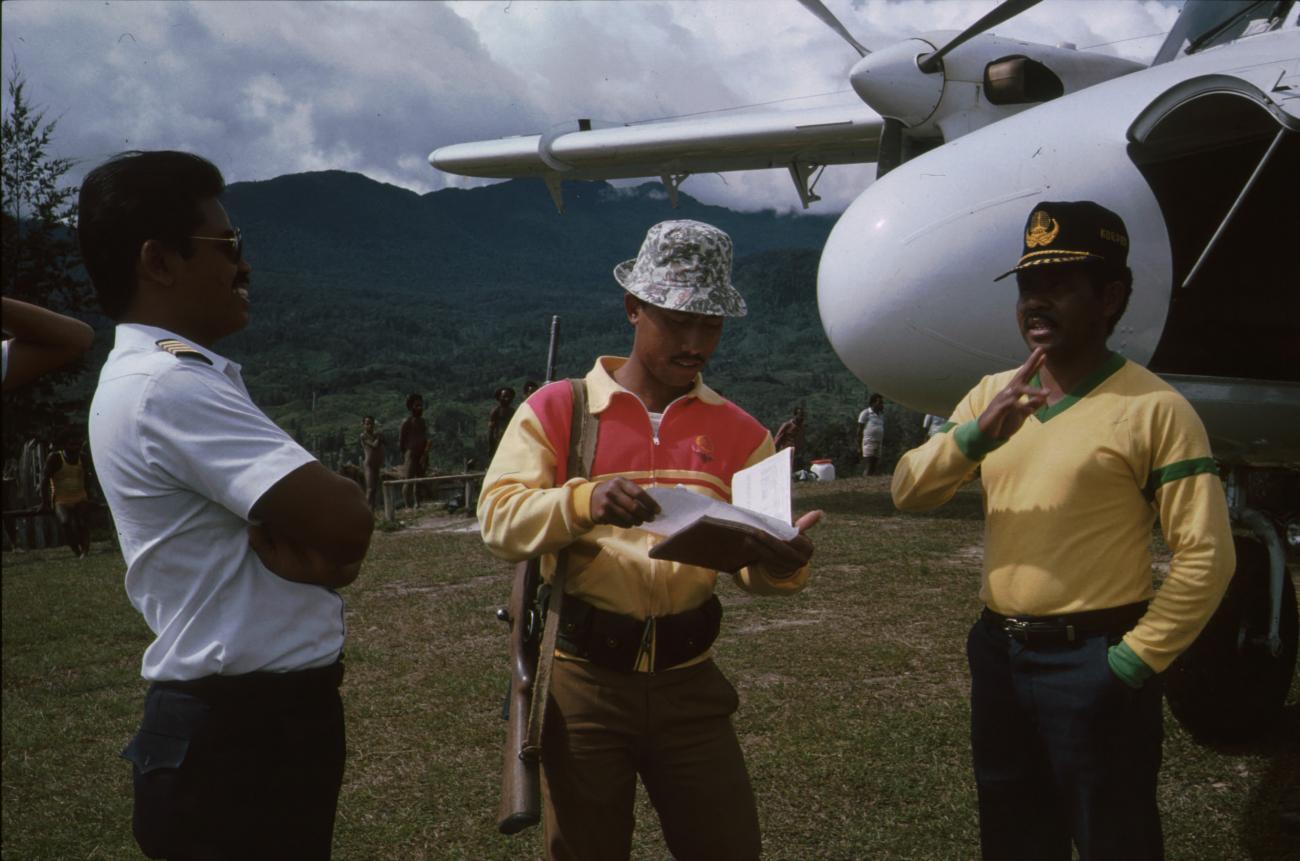 BD/166/222 - 
Three men in front of a plane 2
