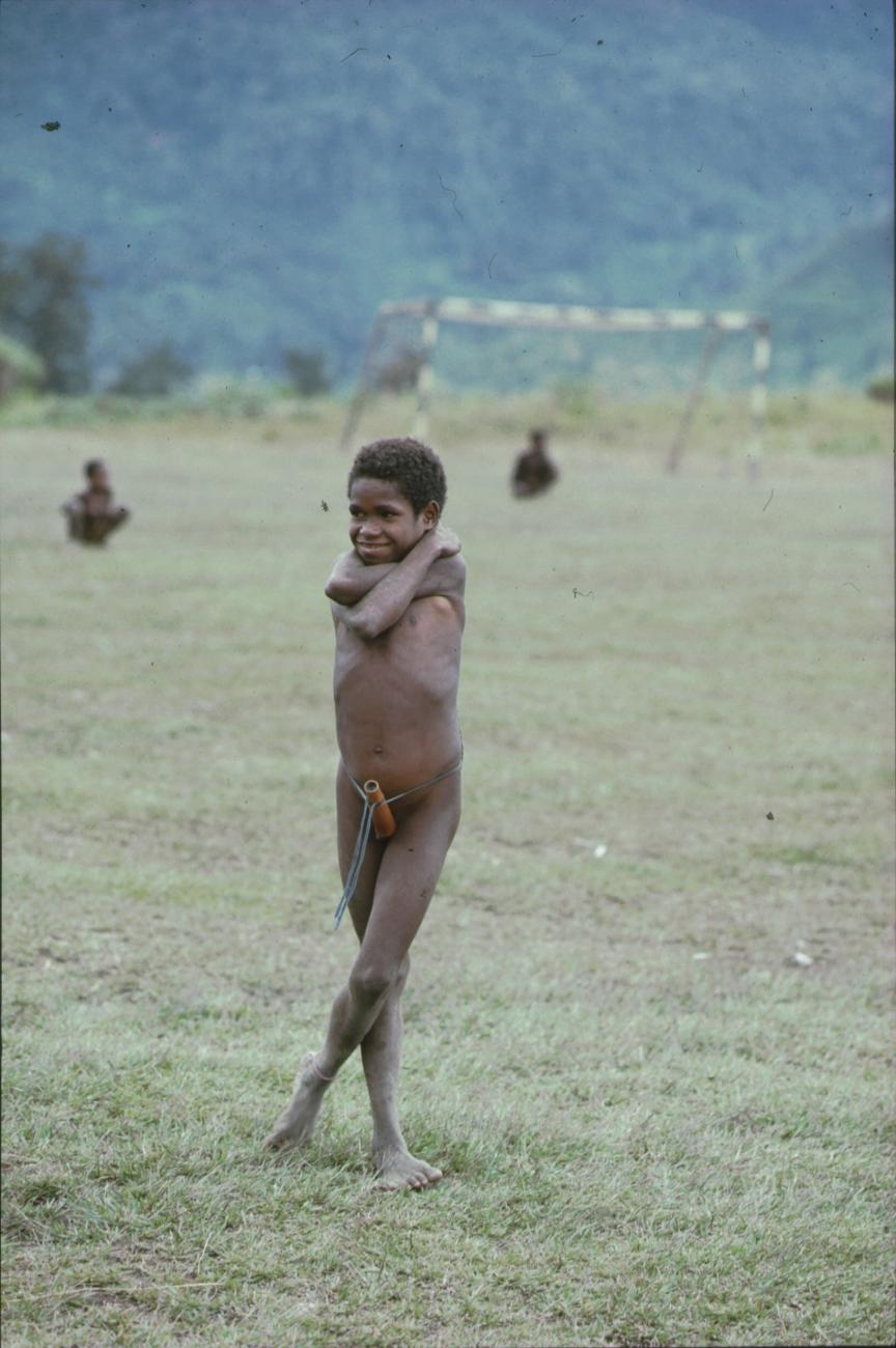 BD/166/361 - 
Small boy embracing himself
