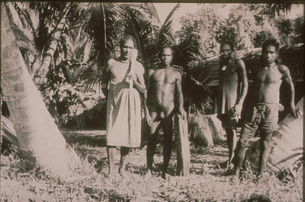 BD/30/23 - 
Group of posing men, some in Western cloths
