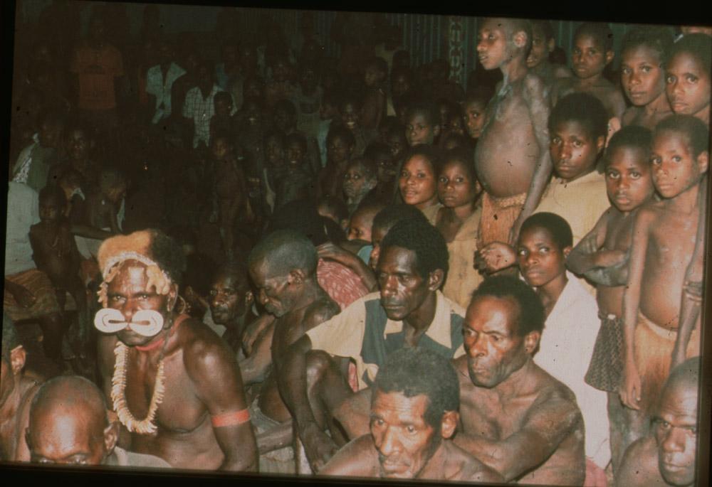 BD/30/51 - 
Meeting of a group of Asmat people with a man in distinguished clothes
