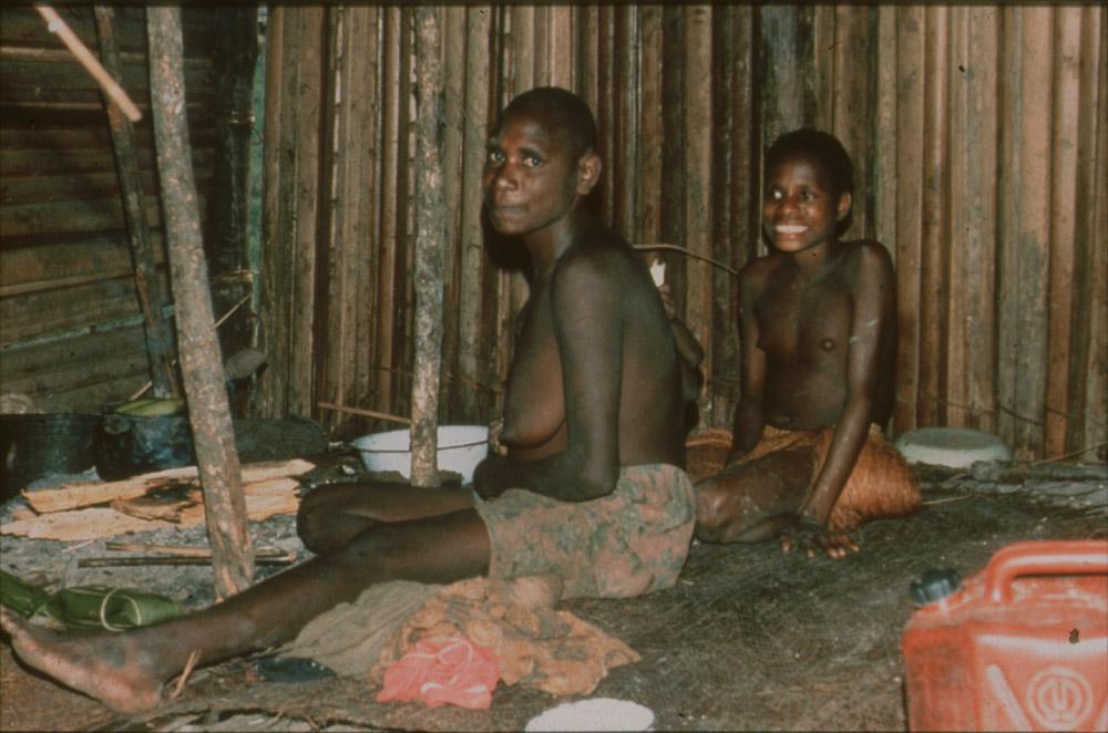 BD/30/78 - 
Two Asmat women sitting inside a house
