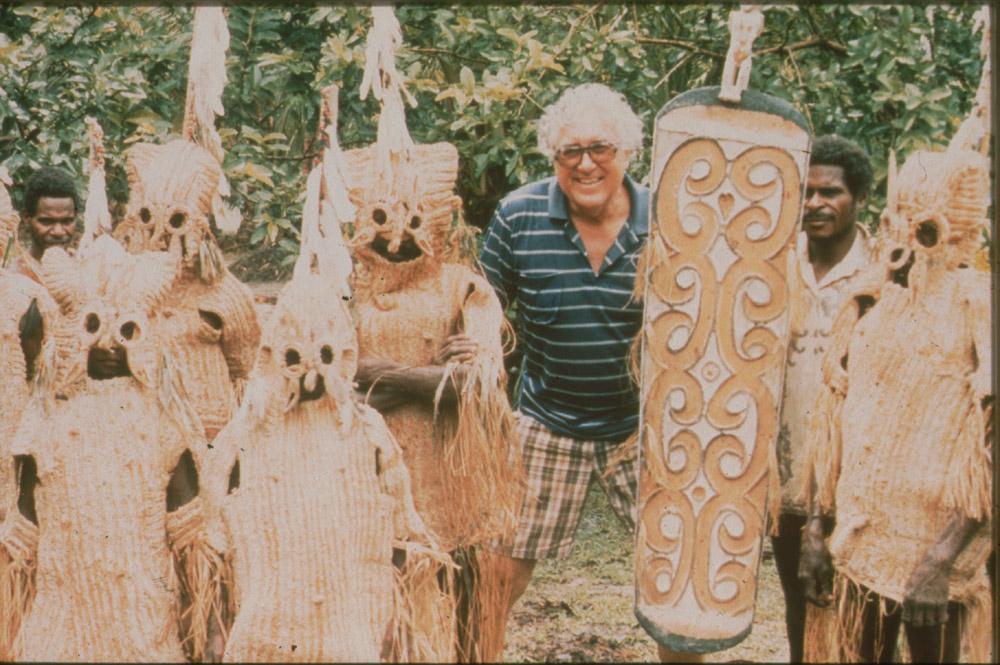 BD/30/89 - 
Doctor Visser amongst Asmat men in mask costums with Asmat shield
