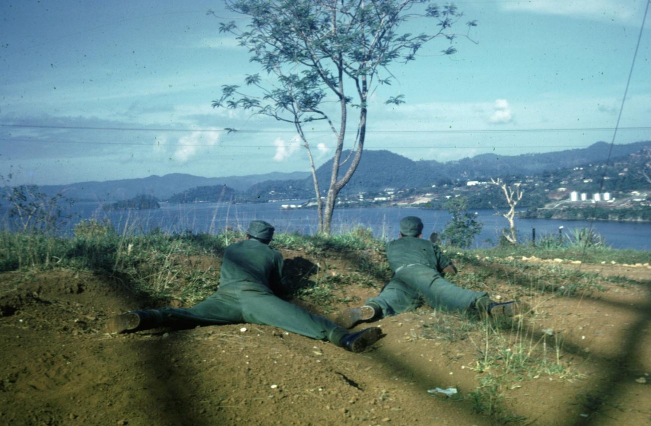 BD/66/40 -
Members of the Volunteer Corps practicing in the mountains near Hollandia