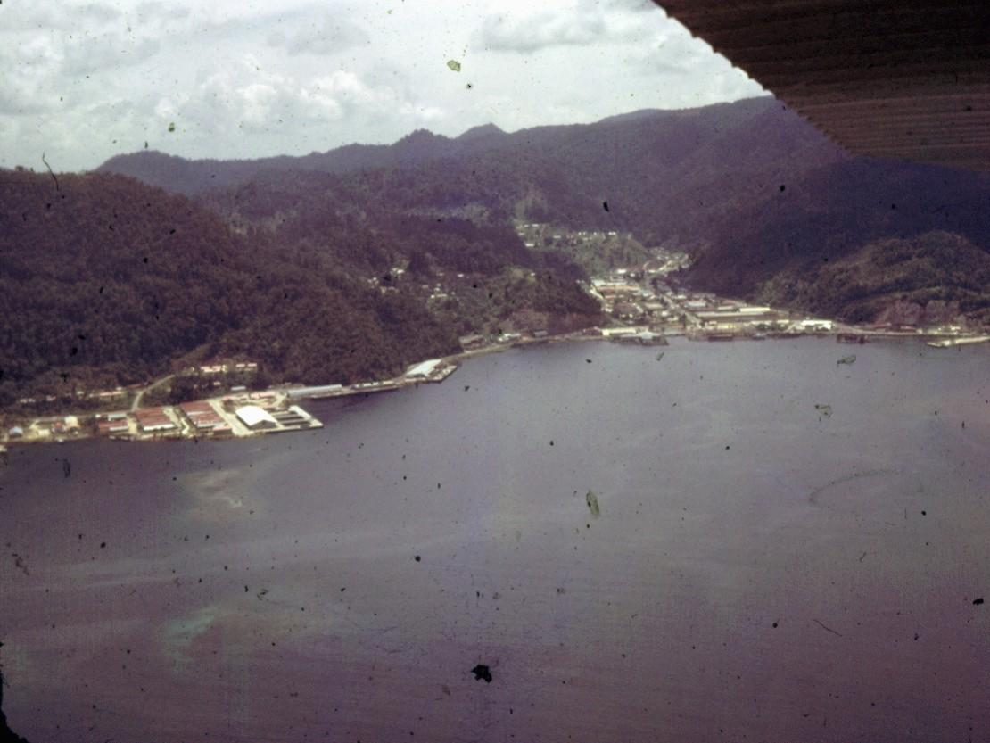BD/66/50 - 
Aerial view of houses and factories in a bay
