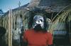BD/209/3086 Man met masker en hoofdtooi