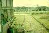 BD/144/289 Woning, voetbalveld op achtergrond