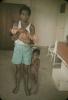 BD/144/453 Vader met baby op arm