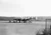BD/133/1072 KLM vliegtuig op landingsbaan in Papoea