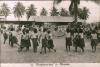 BD/186/110 Meisjesschool in Merauke, dansende meisjes