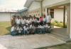 BD/269/500 Ingang S.P.G. gebouw met groep studenten