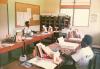 BD/269/80 Personeel van de SMP-school in hun werkomgeving